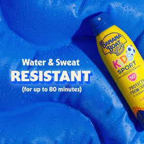 Banana Boat Kids Sunscreen Spray SPF 50 on a beach towel