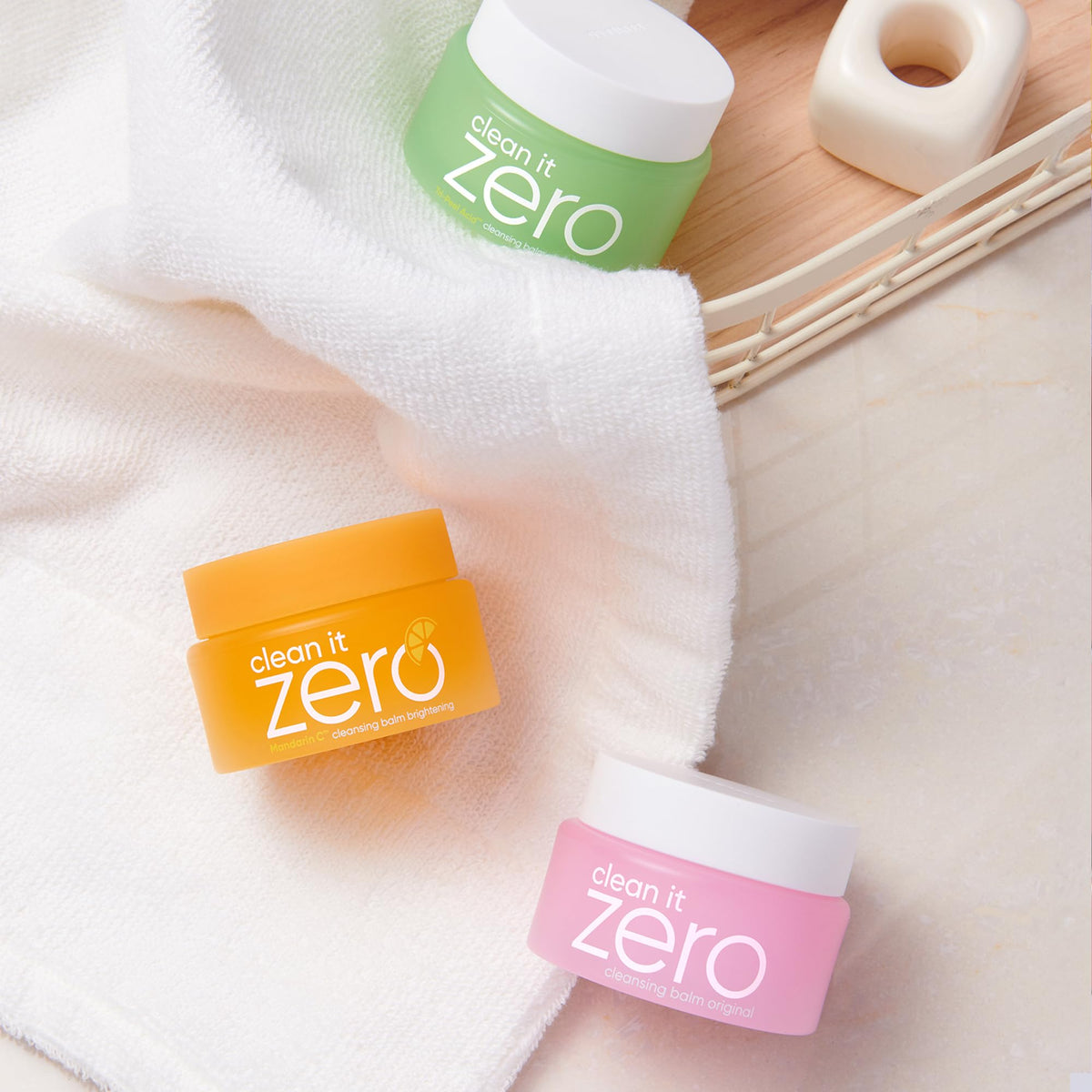 BANILA CO Clean it Zero Balm travel size jars arranged for easy viewing