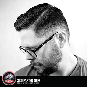 Barber using UPPERCUT DELUXE Pomade on client