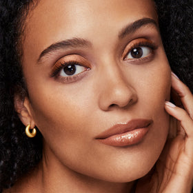 bareMinerals All-Over Face Color Bronzer Warmth loose powder close-up