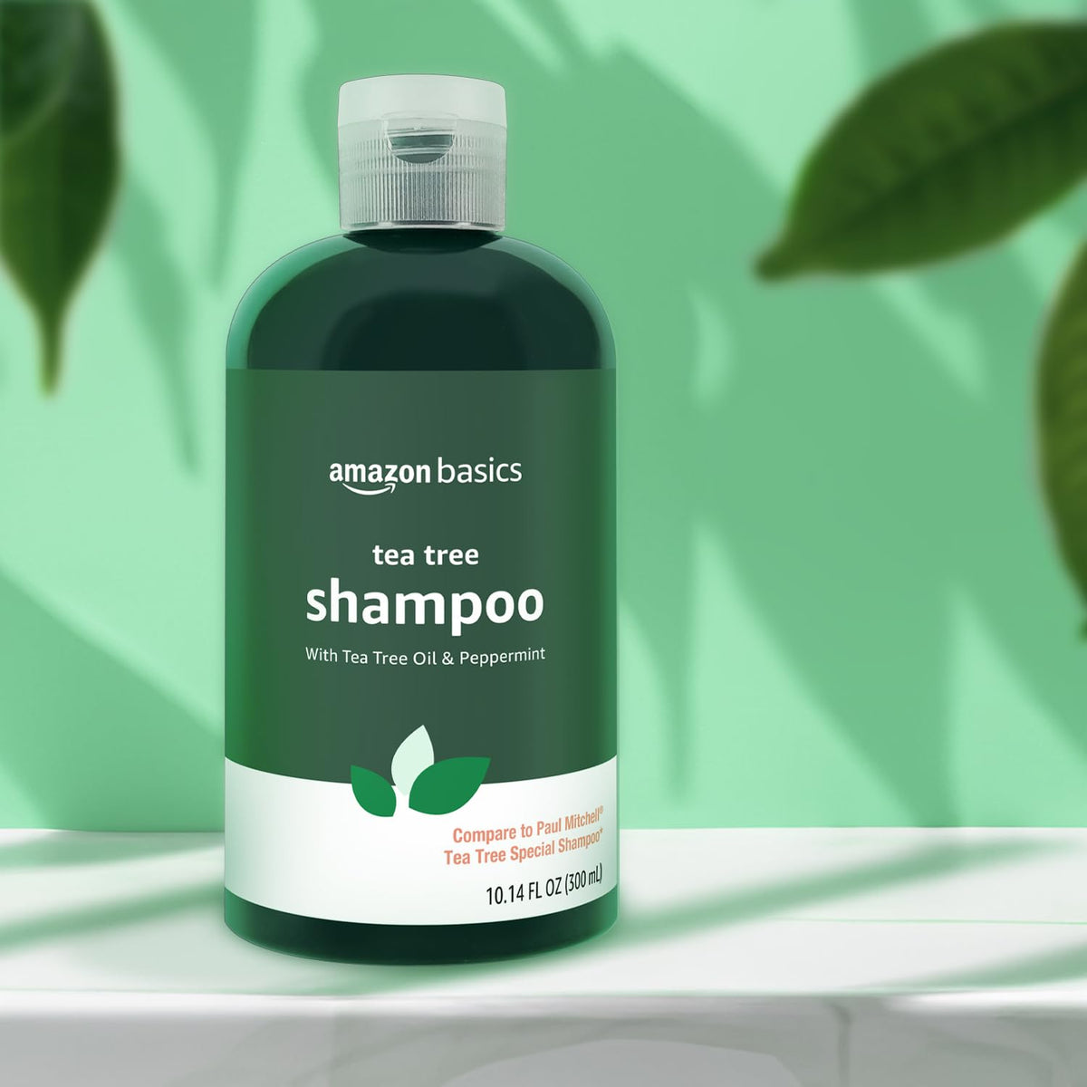 Basics Tea Tree Oil Shampoo on a shower shelf