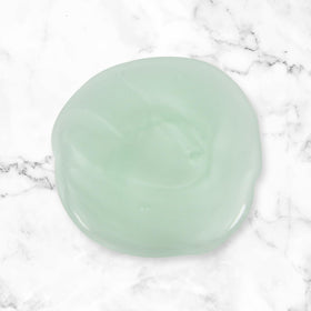 Basics Tea Tree Oil Shampoo with peppermint in a bathroom setting