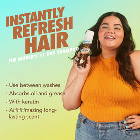 Batiste Dark Dry Shampoo bottles on a bathroom shelf