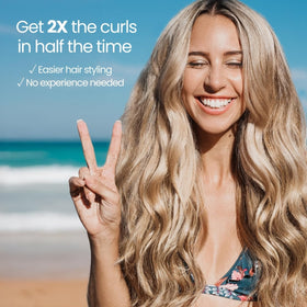 Beachwaver B1 in use creating curls on long hair