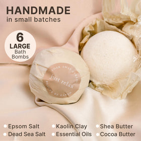 Beauty by Earth bath bomb in a bathtub with bubbles