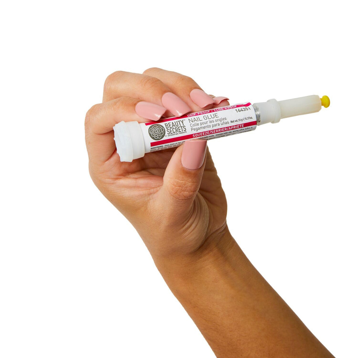 BEAUTY SECRETS Nail Glue in use on artificial nails