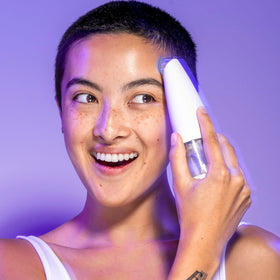 beautybio GLOfacial Tool with charging display stand