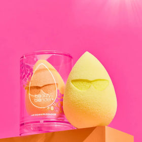 beautyblender Sunshade Makeup Sponge in use with foundation