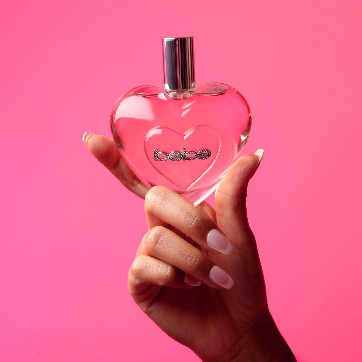 Bebe Luxe Eau de Parfum bottle on vanity