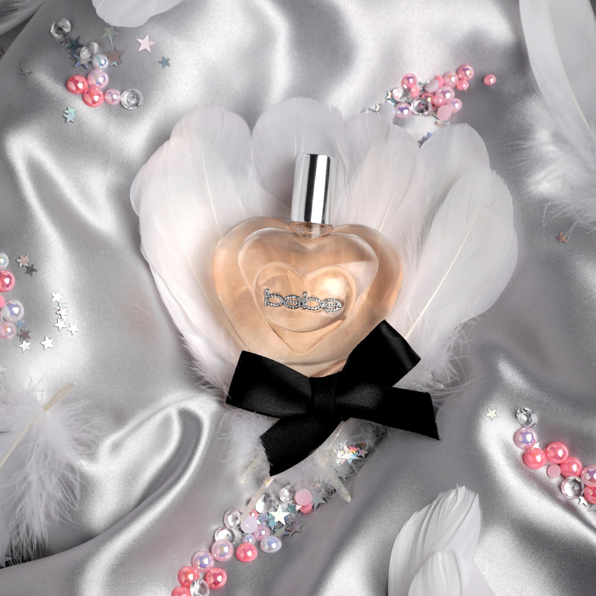 Bebe Luxe Eau de Parfum heart-shaped bottle side view