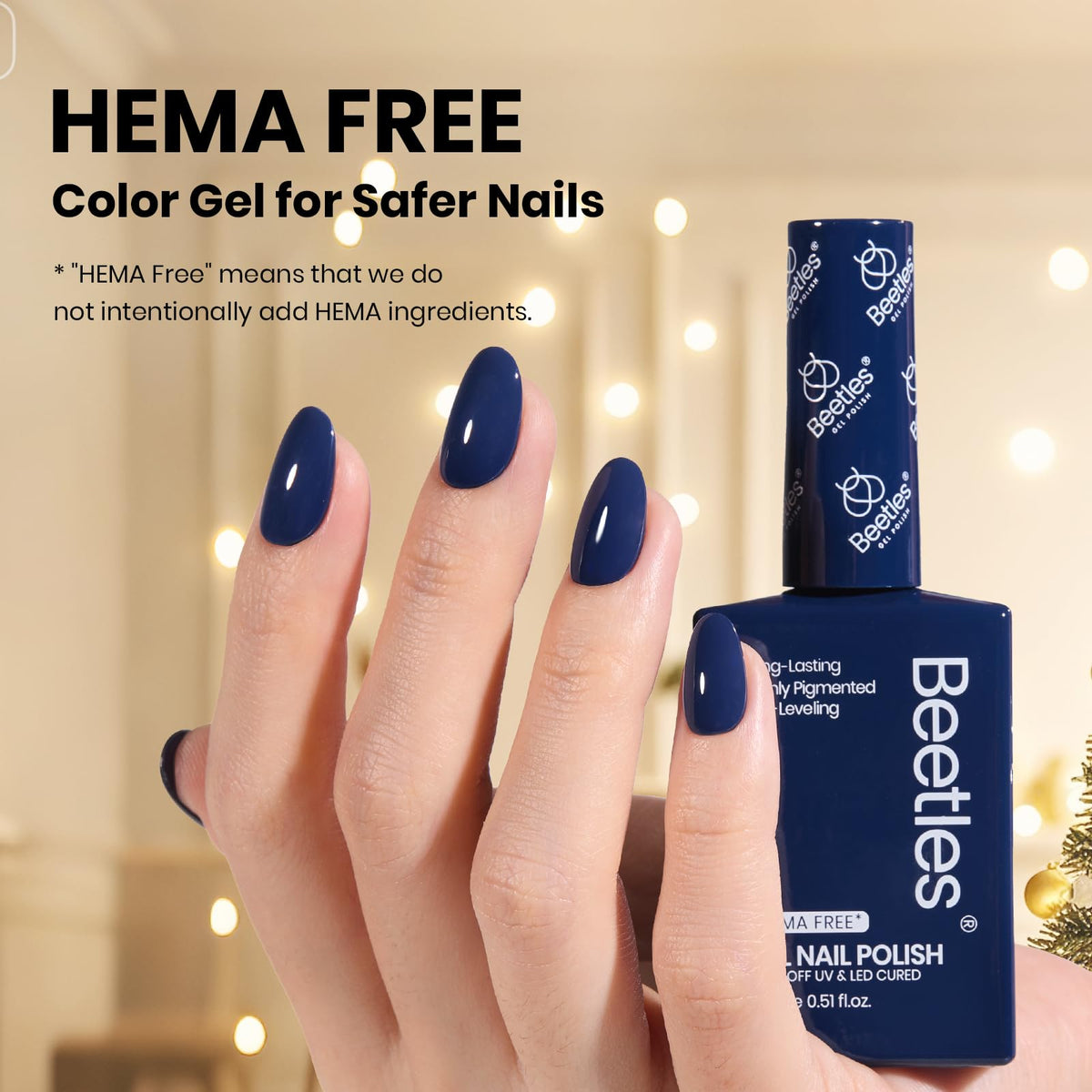 beetles Gel Polish Dark Eclipse Blue applied on nails