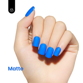 beetles Gel Polish Electric Punk 15ML blue gel nail polish on a nail display