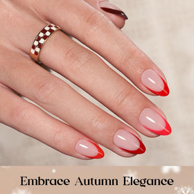 Beetles Red French Tip Press On Nails on a hand for demonstration