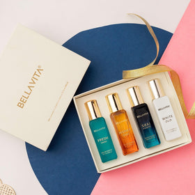 Bella Vita Luxury perfume bottles with floral background