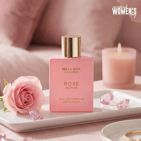 Bella Vita Luxury Rose Eau de Parfum bottle with floral background