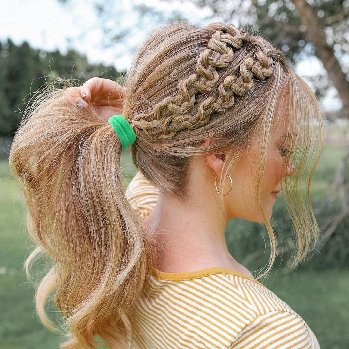 Bessrung hair ties on a wrist as a bracelet