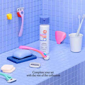 Billie razor set displayed with whipped shave cream