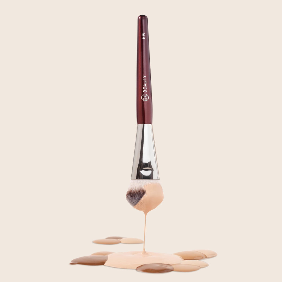BK BEAUTY 109 Mini Contoured Foundation Brush on makeup table