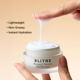 BLITHE Pressed Serum on a bathroom counter