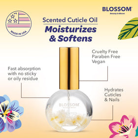 Blossom Cuticle Oil 0.5 fl. oz with flowers on a table