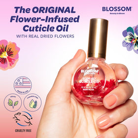 Blossom Cuticle Oil with apple scent on a wooden surface