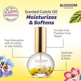 Blossom Cuticle Oil with flowers displayed beside it