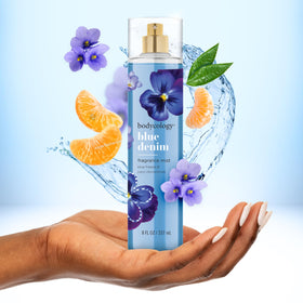 Bodycology Blue Denim Fragrance Mist with floral background