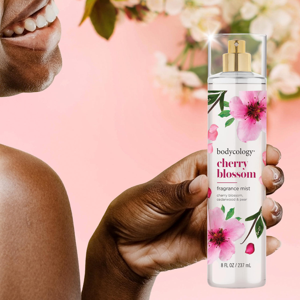 Bodycology Cherry Blossom Fragrance Mist packaging with floral background