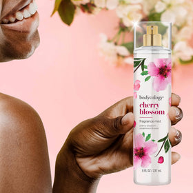 Bodycology Cherry Blossom Fragrance Mist packaging with floral background