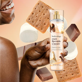 Bodycology Cozy Fireside S'more Body Mist surrounded by marshmallows