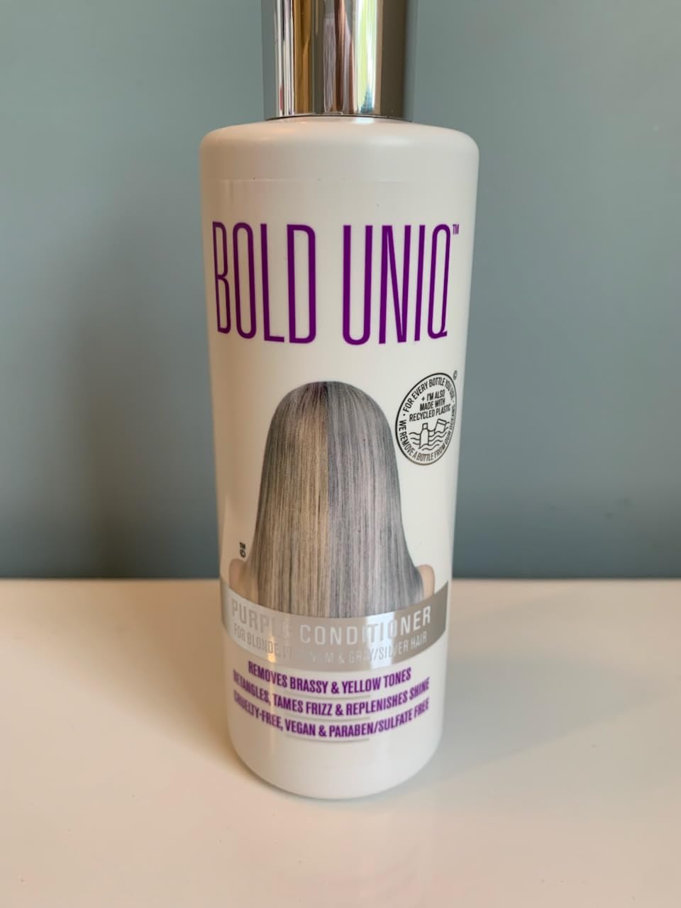 BOLD UNIQ Purple Conditioner in bathroom setting