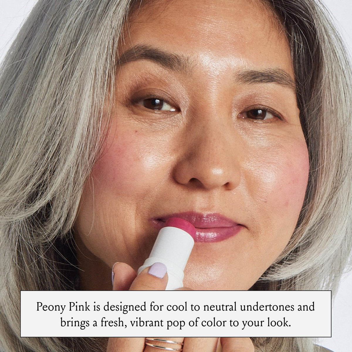 BOOM! Peony Pink Multistick in a travel bag