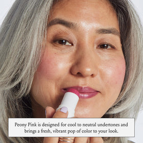 BOOM! Peony Pink Multistick in a travel bag