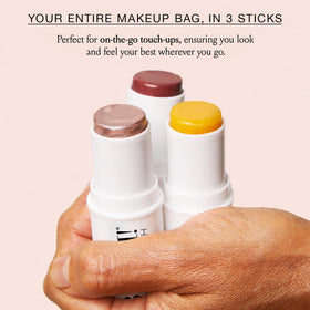 Boomstick Glimmer Highlighter Makeup Stick on a flat surface