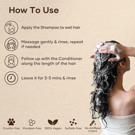 Botanic Hearth Biotin Shampoo displayed with hair care accessories