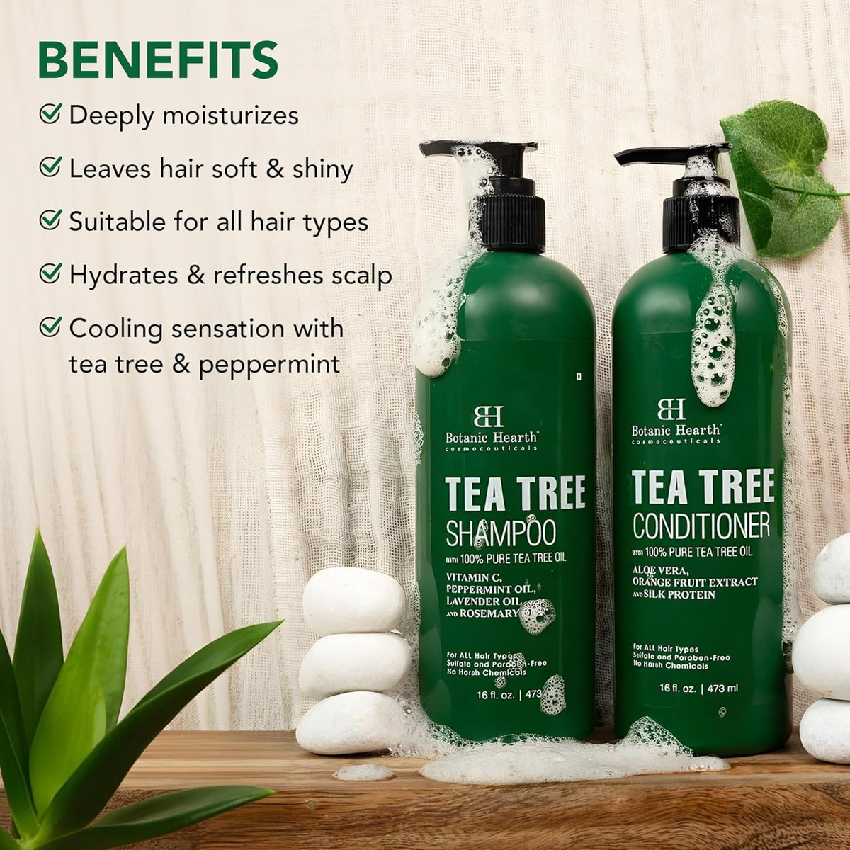 Botanic Hearth Tea Tree Shampoo and Conditioner set on bathroom shelf