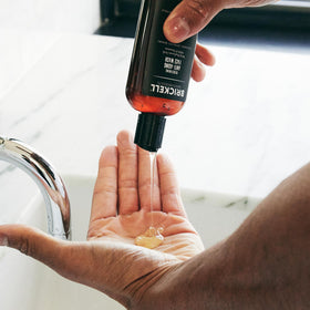 Brickell Men's Anti-Aging Face Wash in bathroom setting