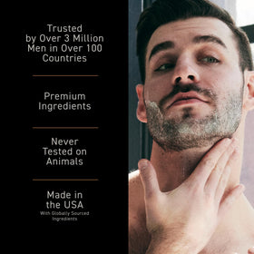 Brickell Men's Renewing Face Scrub in hand with beads visible