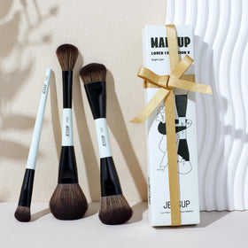 Bright cyan makeup brushes arranged on a vanity