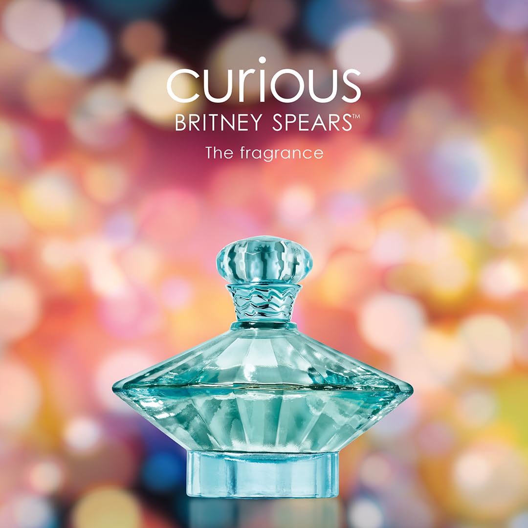 Britney Spears Curious perfume bottle with floral background