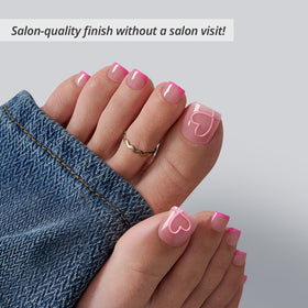 BTArtbox Press On Toenails Soft Romance being applied with nail glue