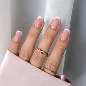 BTARTBOXNAILS White French Tip Press On Nails Kit contents including nail lamp and glue
