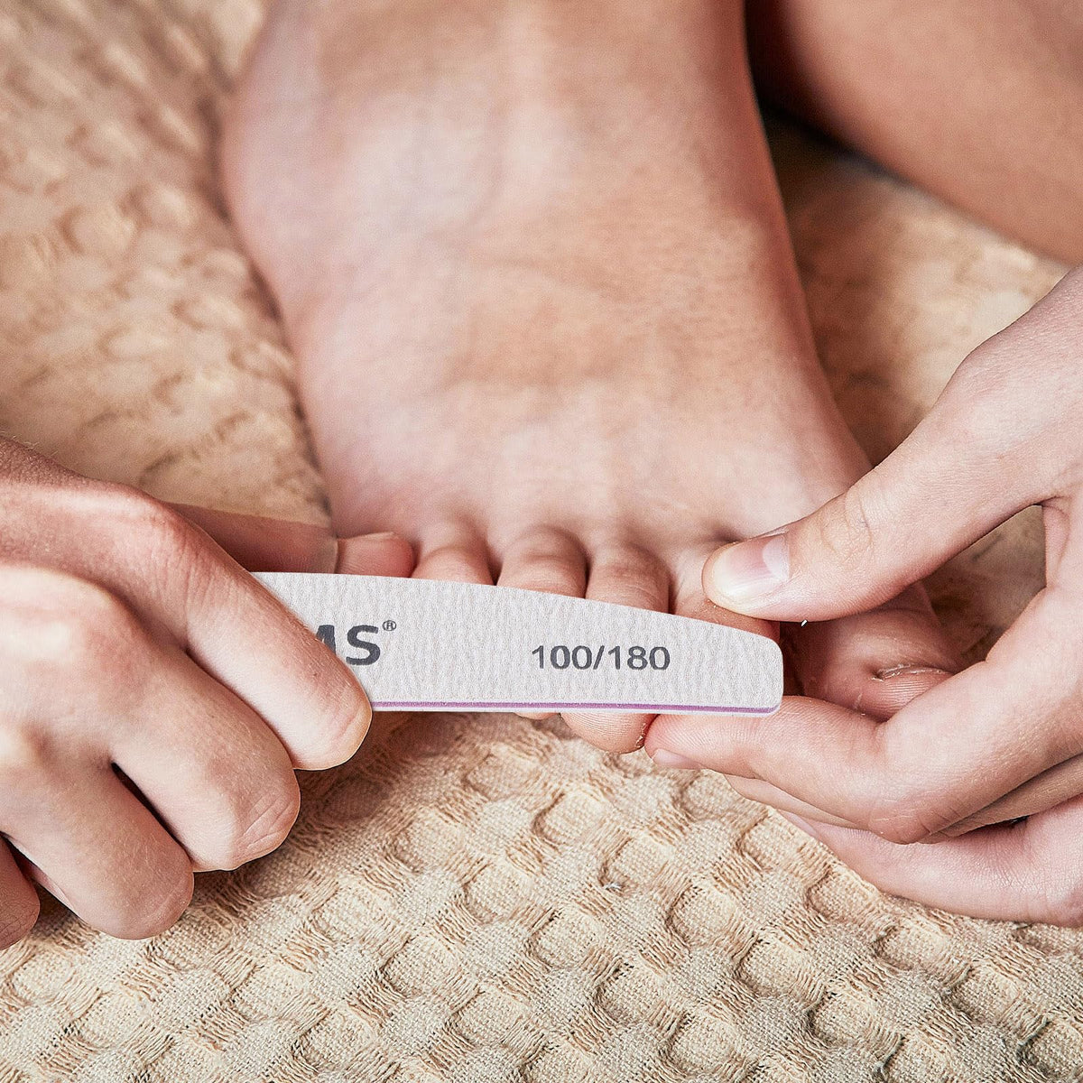 BTYMS nail file in use on acrylic nails