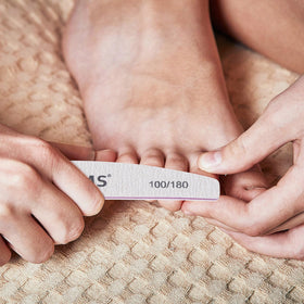 BTYMS nail file in use on acrylic nails