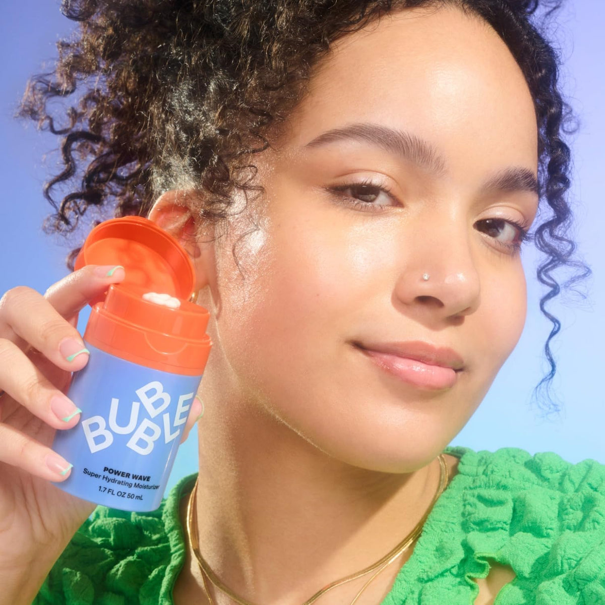 Bubble Skincare Power Wave Face Moisturizer travel size next to skincare products