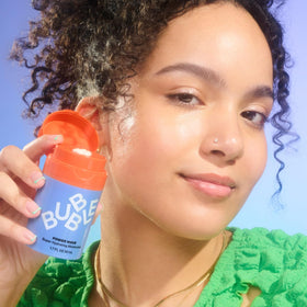 Bubble Skincare Power Wave Face Moisturizer travel size next to skincare products