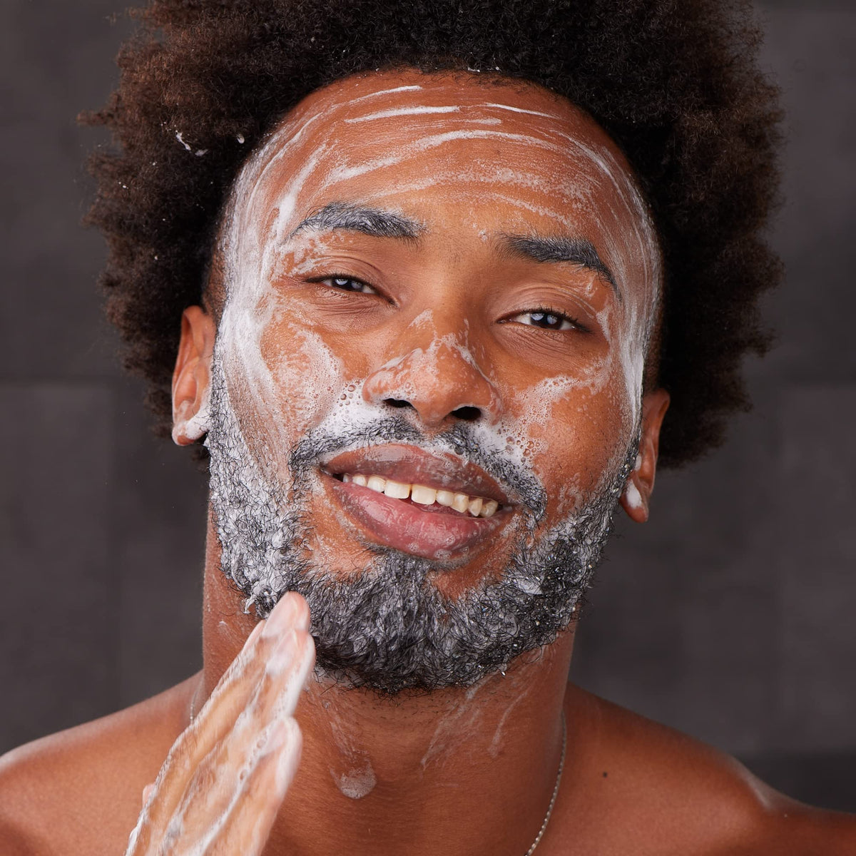 Bulldog face scrub being used in bathroom