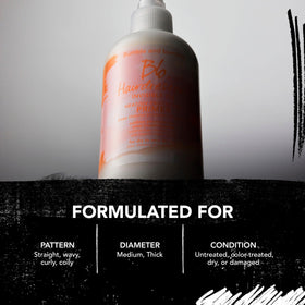 Bumble and bumble Hairdresser's Invisible Oil Leave-In Conditioner in a bathroom setting