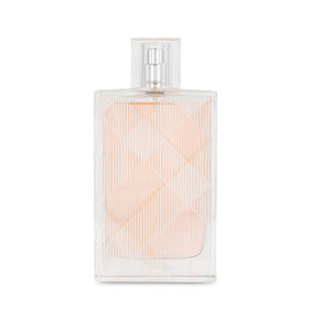 BURBERRY Brit For Her Eau de Toilette bottle with floral background