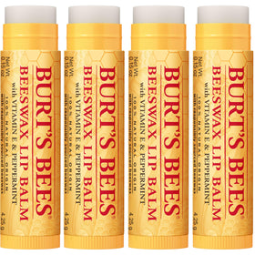 Burt's Bees Beeswax Lip Balm tubes in a purse